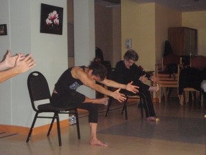 Annette leading chair yoga group